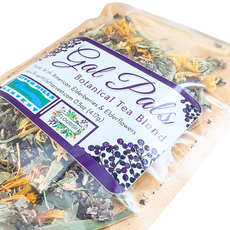Packaged botanical tea blend with visible herbs and a label on a white background