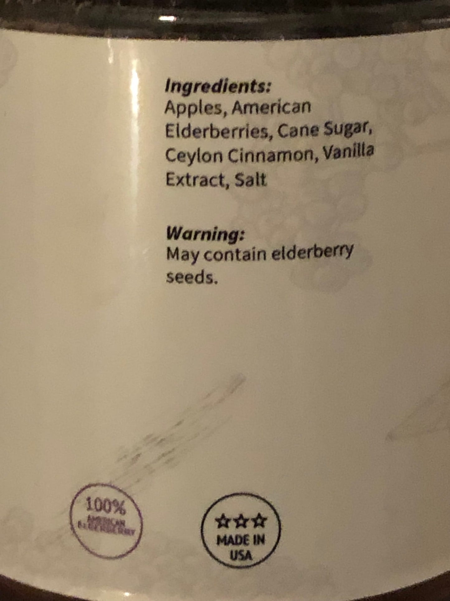 Back of a container with ingredients and warning label