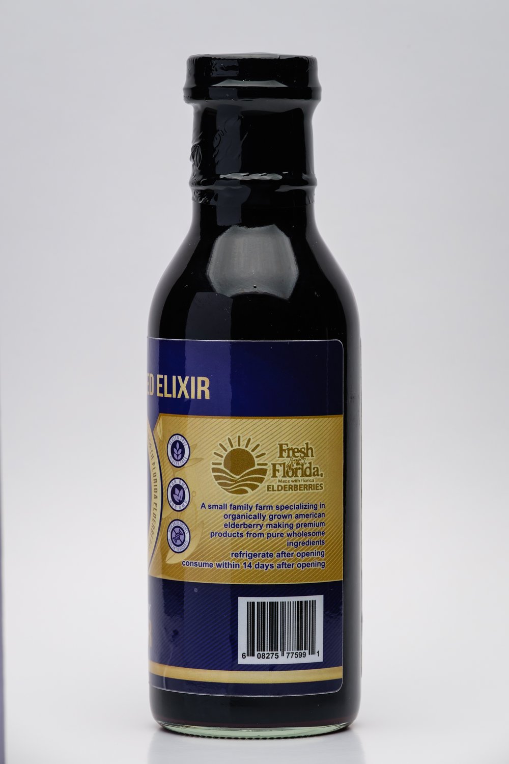 Bottle of North Florida Elderberry Elixir with a label on a white background