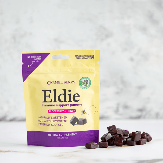 Eldie immune support gummy package with gummies on a white surface