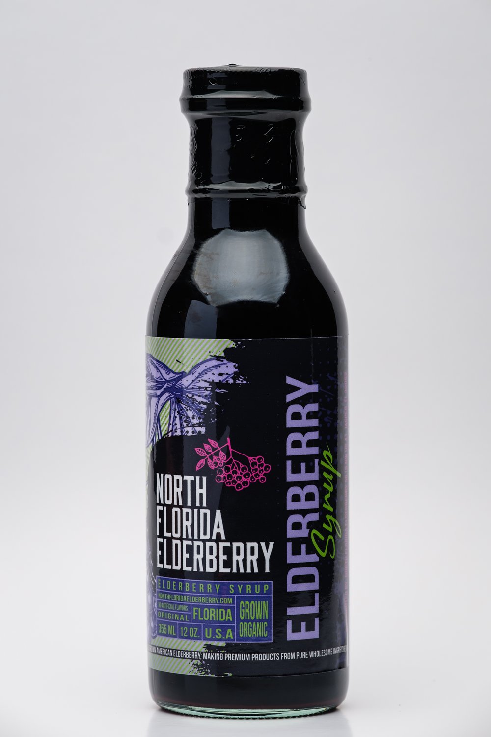Bottle of North Florida Elderberry Syrup on a white background
